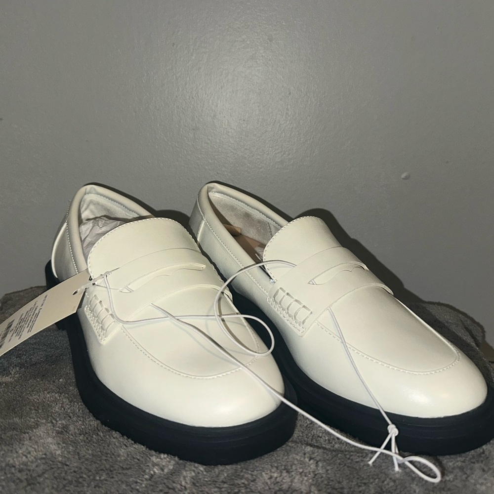 White and Black Slip-On Loafers with Textured Upper